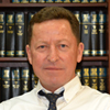 TIM L. ROBERTS